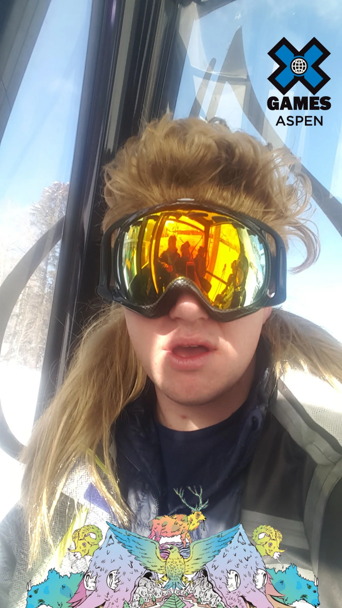Snow goggles, blonde mullet, somewhere cold and loud.