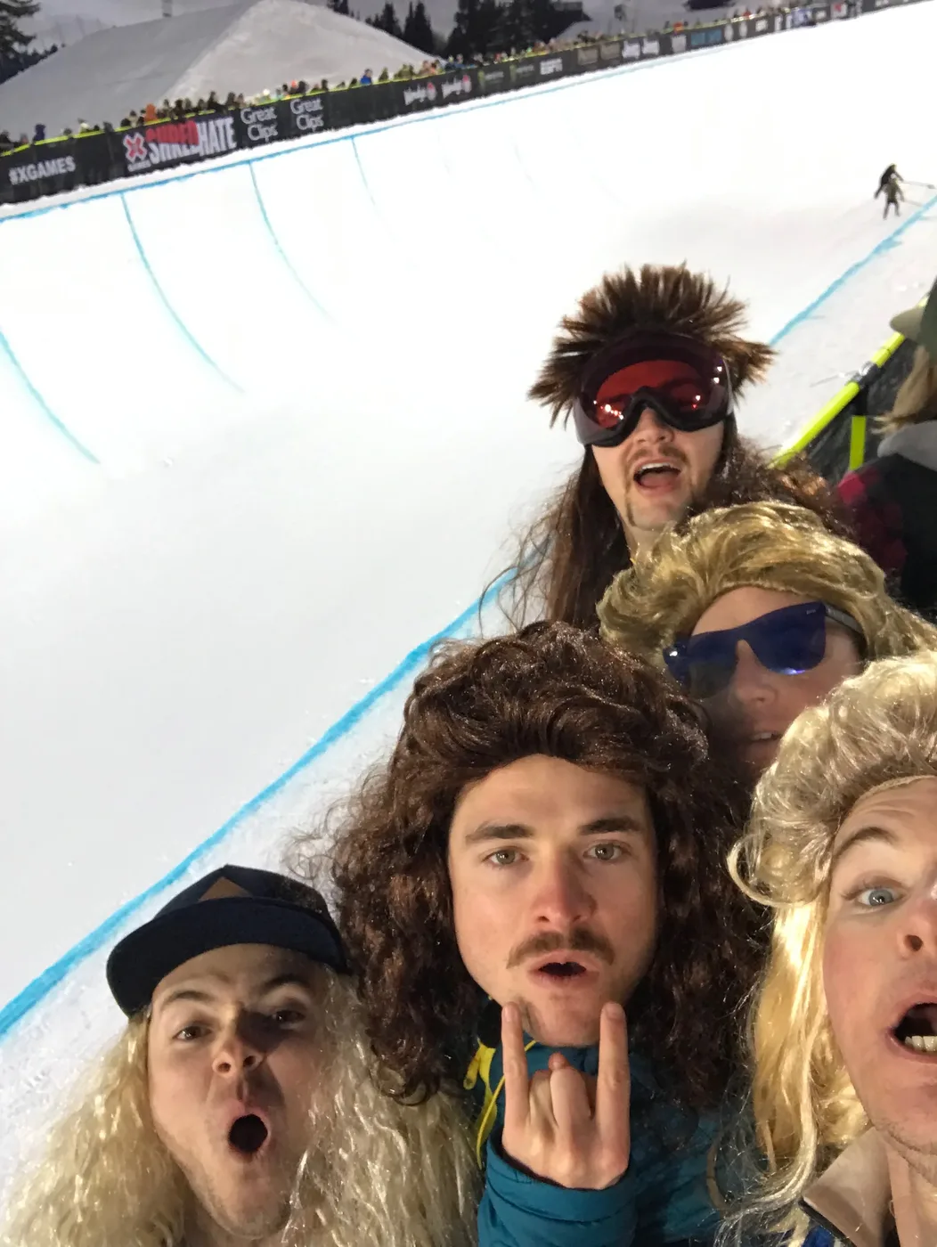 Friends in mullets and masks out at the ice rink