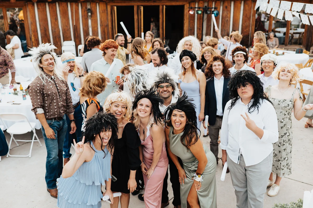 A whole crowd in mullets, nobody told to smile, everybody did.